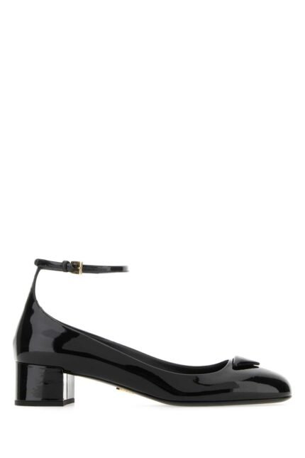 Black leather pumps